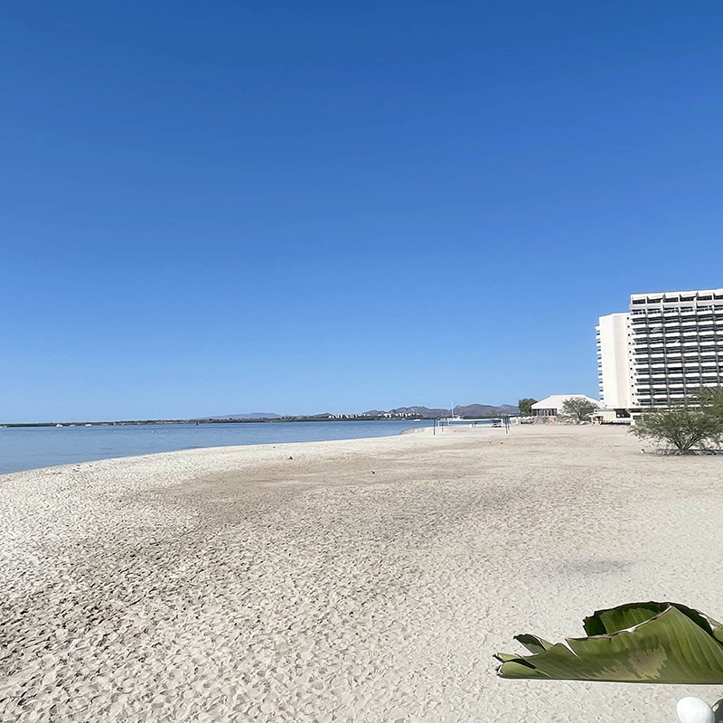 La Posada Beach starts out with this wide sandy expanse perfect for a beach wedding or family get together