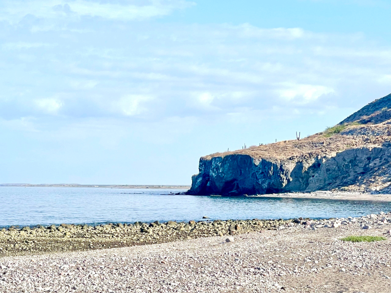 A natural cave and clifs provide protection from the sun
