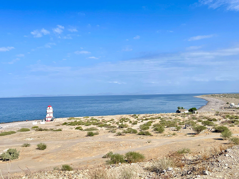 The rugged shoreline in front of the hotel includes a lighhouse BnB and wind swept beach